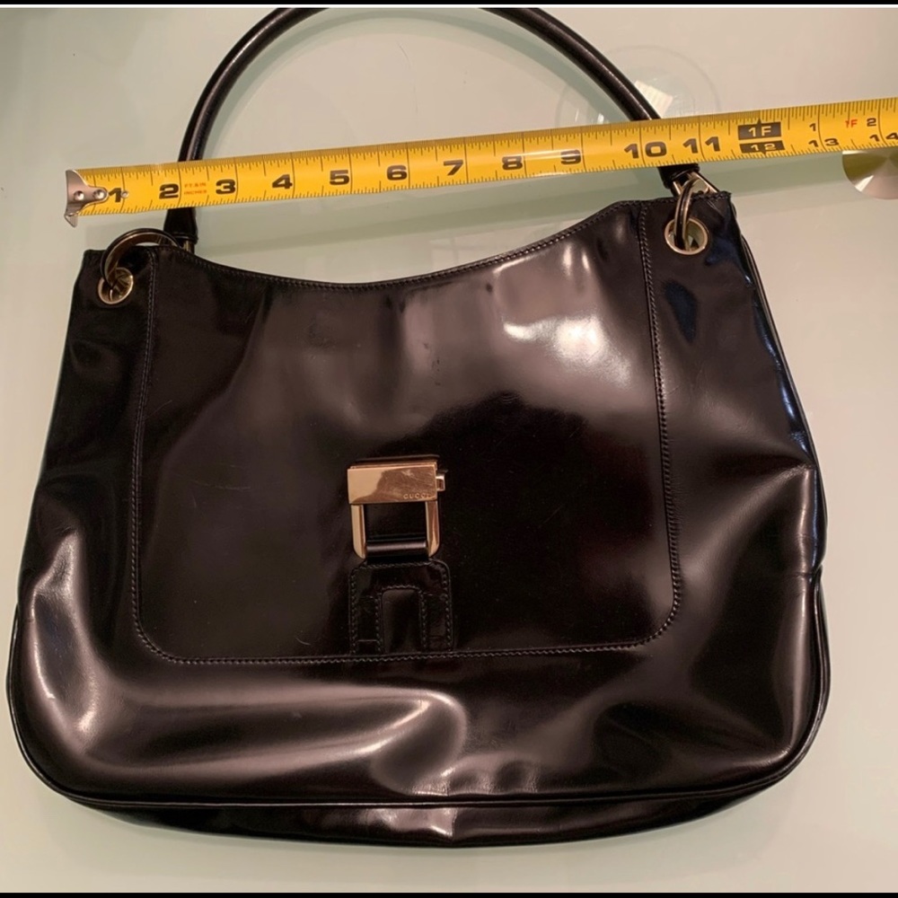 Gucci patten leather purse.
